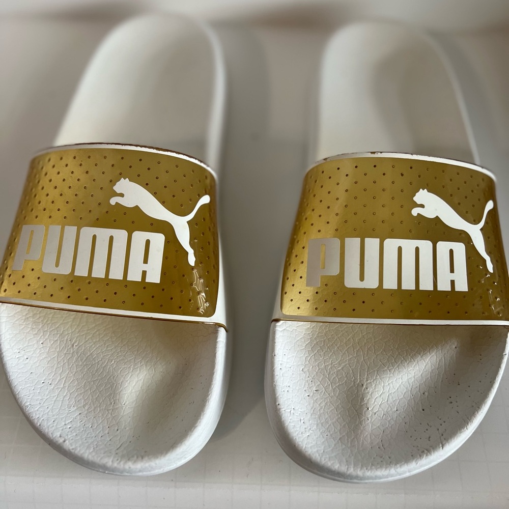Puma White Slides with Vinyl  Logo Strap. ALL WHITE SPRING SUMMER WEAR